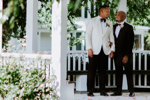 Groom posing in gazebo